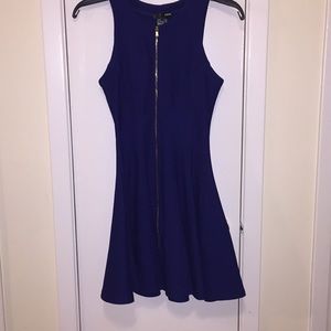 Aqua blue dress with gold zipper.